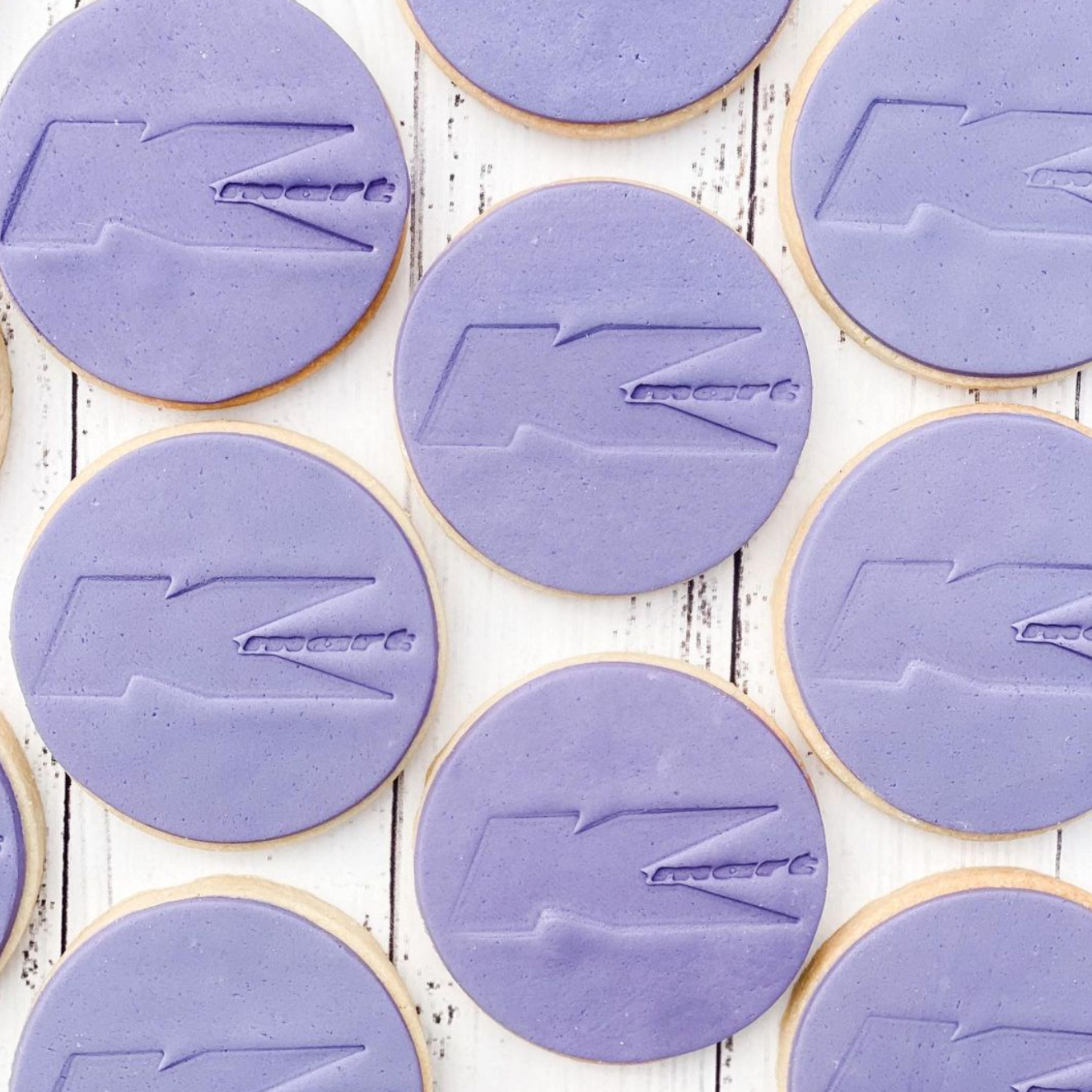purple round cookie with Kmart logo embossed into fondant