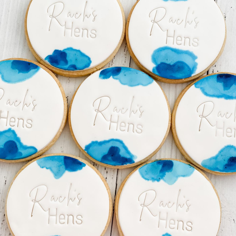 blue watercolour cookies on white background. round sugar cookie 